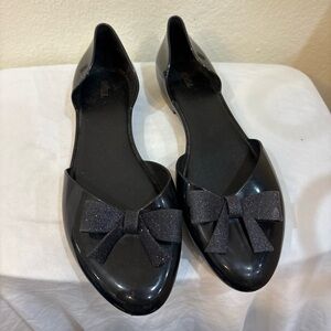 Melissa Seduction black flats with a glitter bow